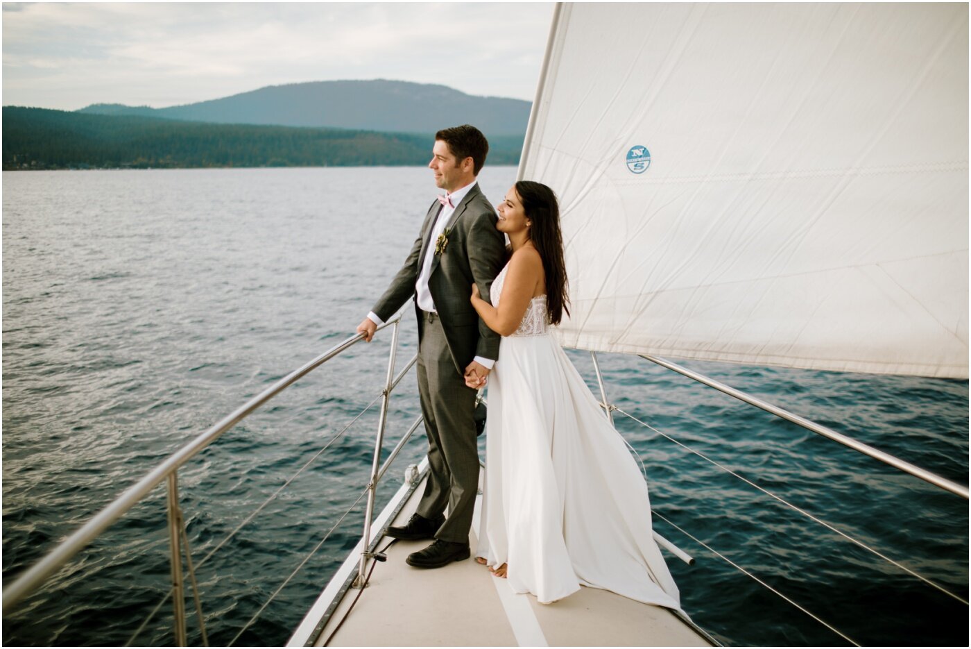 bride and groom sailing on a boat after their elopement
